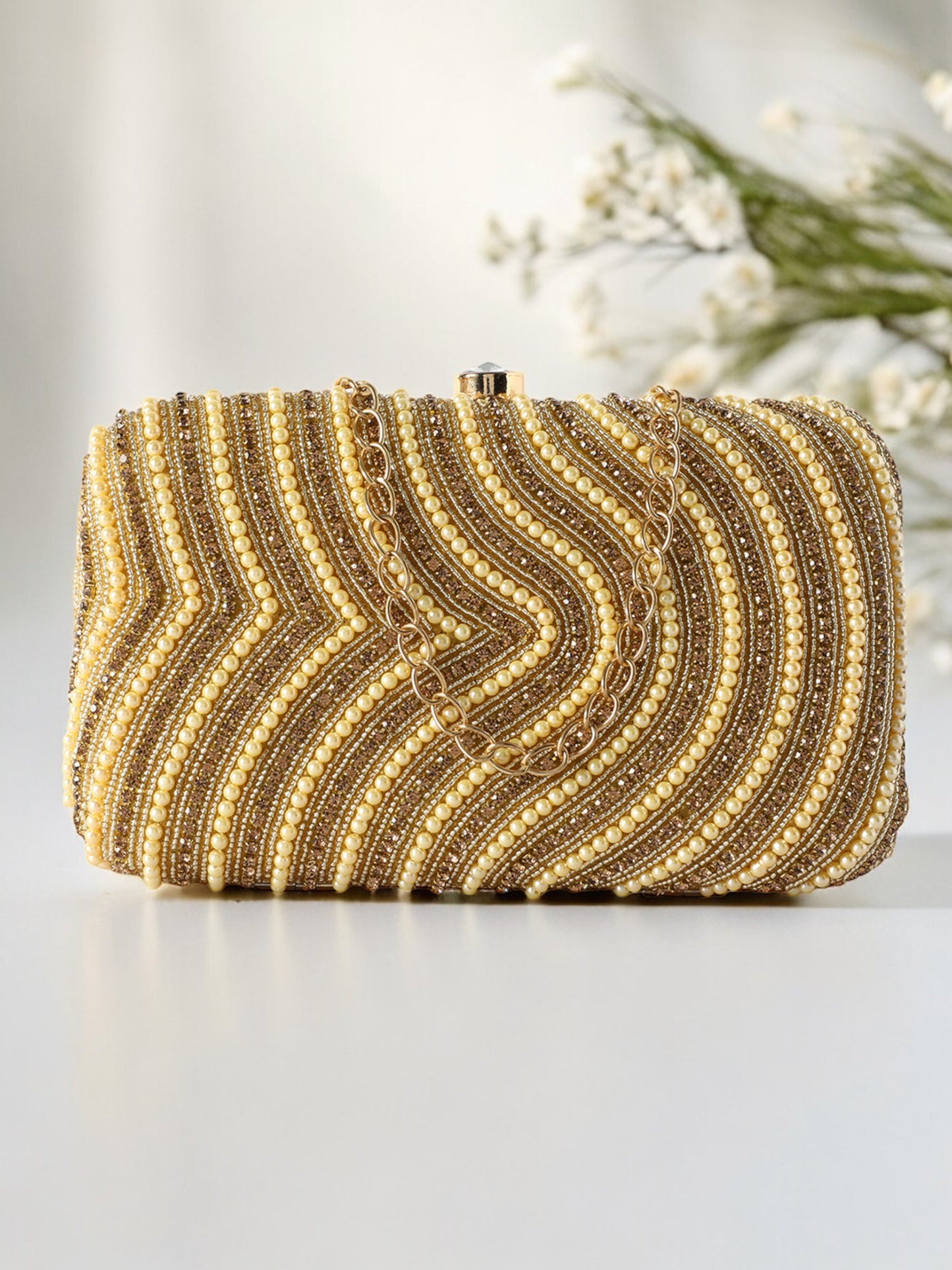 Golden Purse with Circular Multi-Shell Embellishments and Embroidery